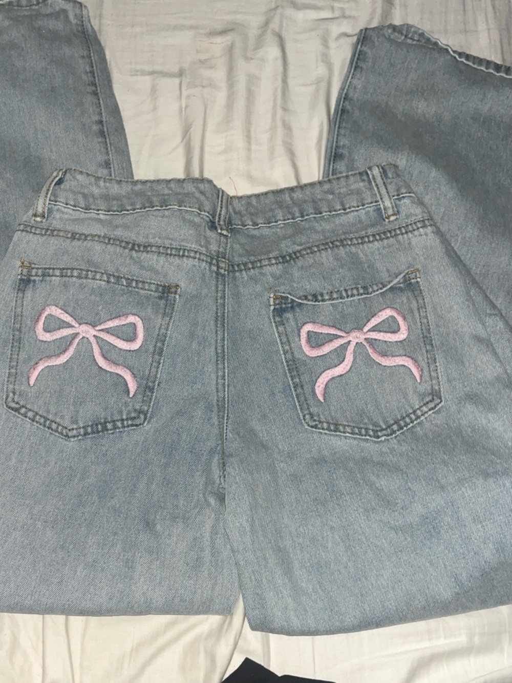 Edikted Light Wash Straight Leg Jeans with Pink Bow Back Embroidery